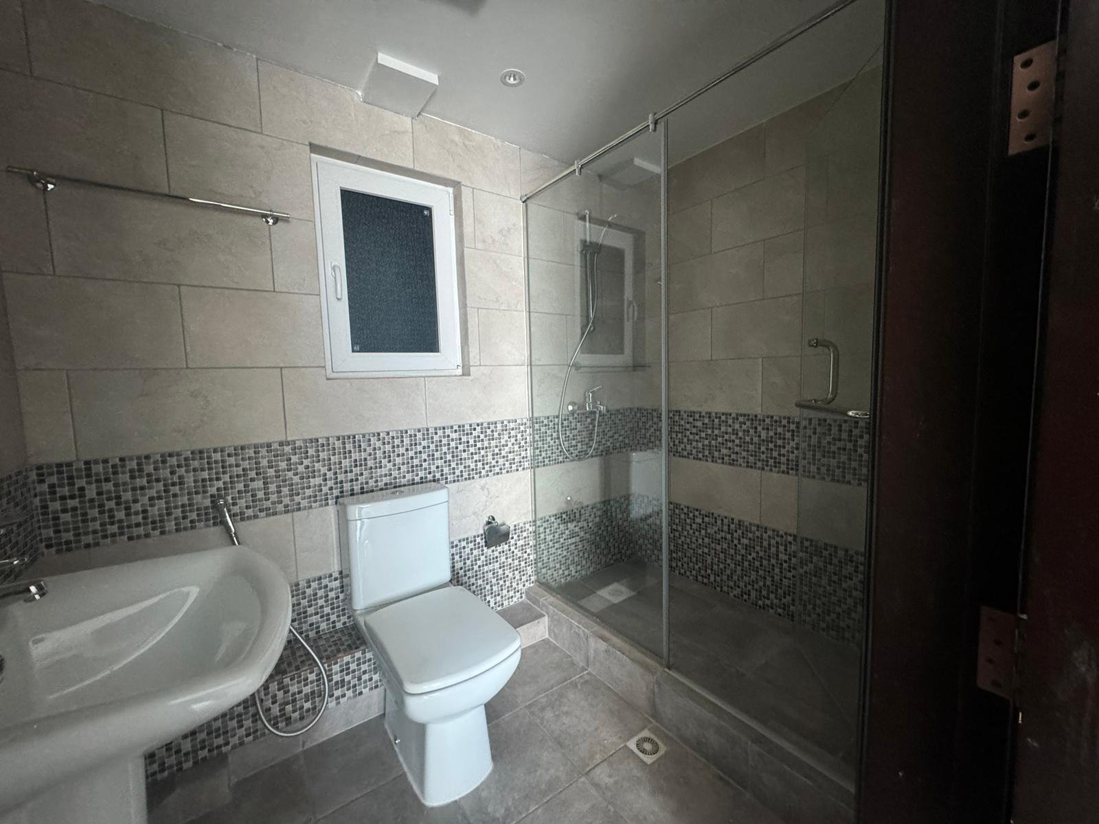 Spacious CityView 1-Bedroom Apartment In The Heart of Sanabis.