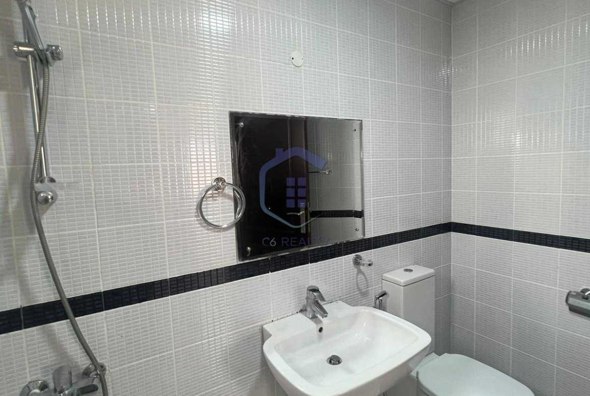 Elegant Three-Bedroom Apartment with Modern Amenities